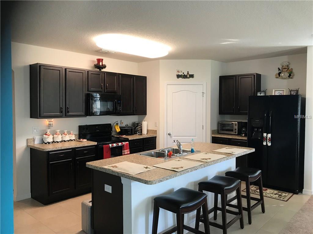 6162 FOREST RIDGE WAY, WINTER HAVEN, Florida 33881, 4 Bedrooms Bedrooms, 6 Rooms Rooms,2 BathroomsBathrooms,Residential,For sale,FOREST RIDGE,O5556553