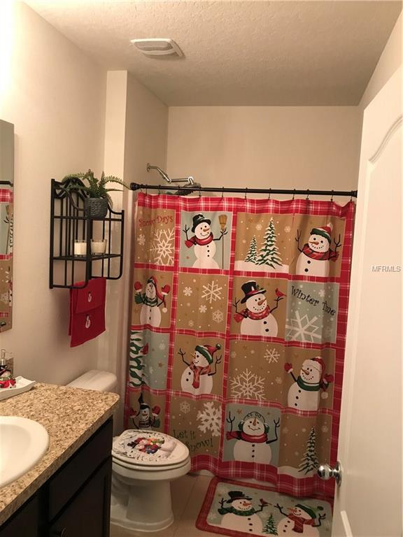 6162 FOREST RIDGE WAY, WINTER HAVEN, Florida 33881, 4 Bedrooms Bedrooms, 6 Rooms Rooms,2 BathroomsBathrooms,Residential,For sale,FOREST RIDGE,O5556553