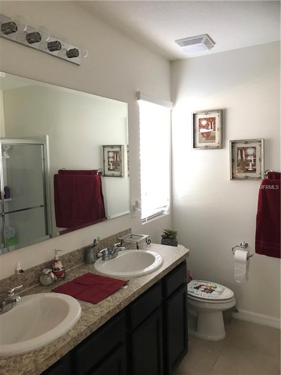 6162 FOREST RIDGE WAY, WINTER HAVEN, Florida 33881, 4 Bedrooms Bedrooms, 6 Rooms Rooms,2 BathroomsBathrooms,Residential,For sale,FOREST RIDGE,O5556553