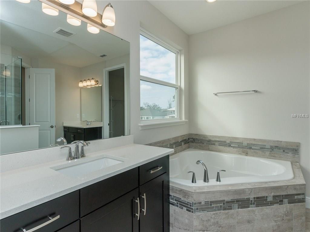 404 WHITE COTTON CIRCLE, OVIEDO, Florida 32765, 5 Bedrooms Bedrooms, 11 Rooms Rooms,4 BathroomsBathrooms,Residential,For sale,WHITE COTTON,O5496609