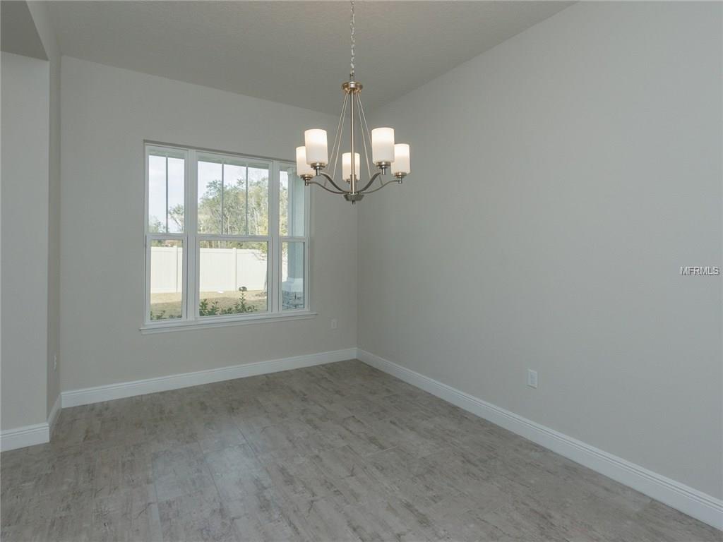 404 WHITE COTTON CIRCLE, OVIEDO, Florida 32765, 5 Bedrooms Bedrooms, 11 Rooms Rooms,4 BathroomsBathrooms,Residential,For sale,WHITE COTTON,O5496609