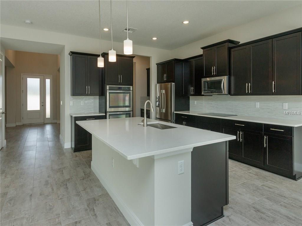 404 WHITE COTTON CIRCLE, OVIEDO, Florida 32765, 5 Bedrooms Bedrooms, 11 Rooms Rooms,4 BathroomsBathrooms,Residential,For sale,WHITE COTTON,O5496609