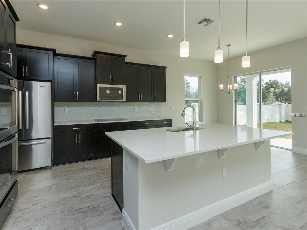 404 WHITE COTTON CIRCLE, OVIEDO, Florida 32765, 5 Bedrooms Bedrooms, 11 Rooms Rooms,4 BathroomsBathrooms,Residential,For sale,WHITE COTTON,O5496609