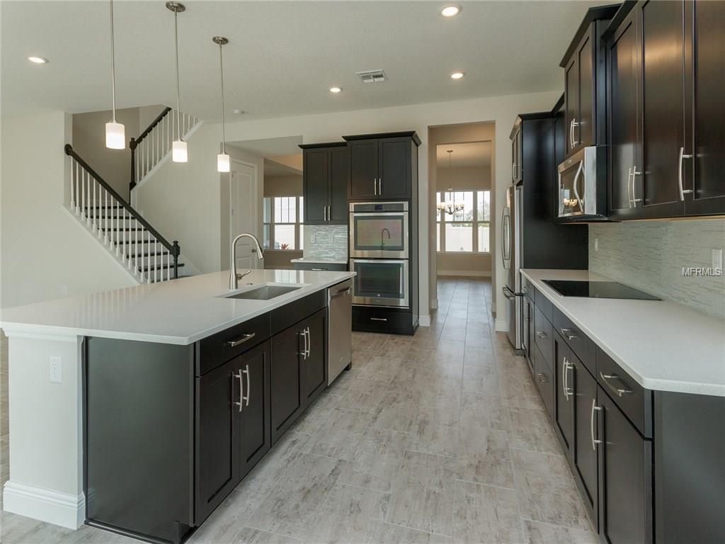 404 WHITE COTTON CIRCLE, OVIEDO, Florida 32765, 5 Bedrooms Bedrooms, 11 Rooms Rooms,4 BathroomsBathrooms,Residential,For sale,WHITE COTTON,O5496609