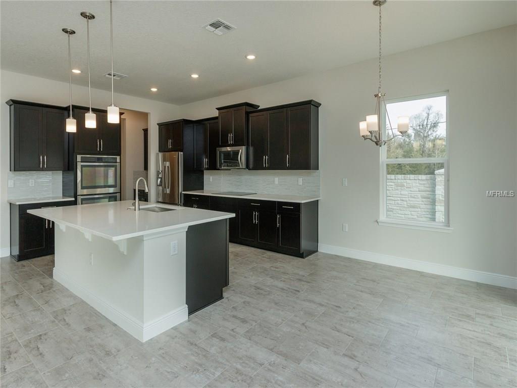 404 WHITE COTTON CIRCLE, OVIEDO, Florida 32765, 5 Bedrooms Bedrooms, 11 Rooms Rooms,4 BathroomsBathrooms,Residential,For sale,WHITE COTTON,O5496609