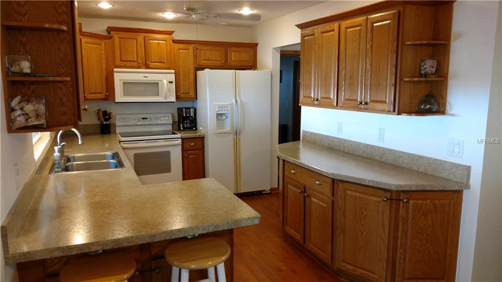 1238 RANCHWOOD DRIVE E, DUNEDIN, Florida 34698, 3 Bedrooms Bedrooms, 8 Rooms Rooms,2 BathroomsBathrooms,Residential,For sale,RANCHWOOD,U7831054