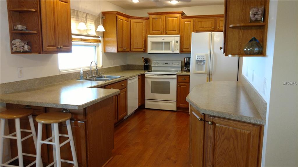 1238 RANCHWOOD DRIVE E, DUNEDIN, Florida 34698, 3 Bedrooms Bedrooms, 8 Rooms Rooms,2 BathroomsBathrooms,Residential,For sale,RANCHWOOD,U7831054