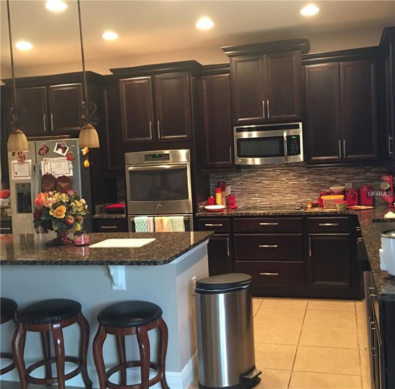 2243 WAUKEGAN DRIVE, KISSIMMEE, Florida 34758, 4 Bedrooms Bedrooms, 10 Rooms Rooms,3 BathroomsBathrooms,Residential,For sale,WAUKEGAN,S4856840