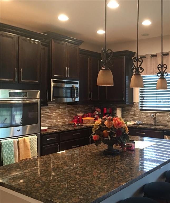 2243 WAUKEGAN DRIVE, KISSIMMEE, Florida 34758, 4 Bedrooms Bedrooms, 10 Rooms Rooms,3 BathroomsBathrooms,Residential,For sale,WAUKEGAN,S4856840