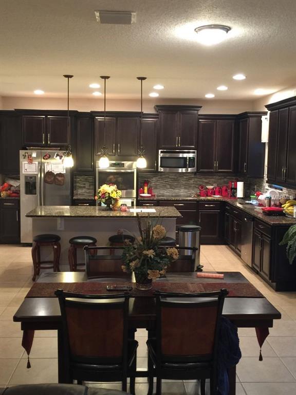 2243 WAUKEGAN DRIVE, KISSIMMEE, Florida 34758, 4 Bedrooms Bedrooms, 10 Rooms Rooms,3 BathroomsBathrooms,Residential,For sale,WAUKEGAN,S4856840