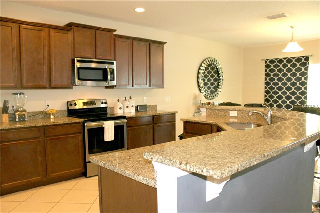 114 MALAGA AVENUE, DAVENPORT, Florida 33837, 5 Bedrooms Bedrooms, 13 Rooms Rooms,3 BathroomsBathrooms,Residential,For sale,MALAGA,S4848839