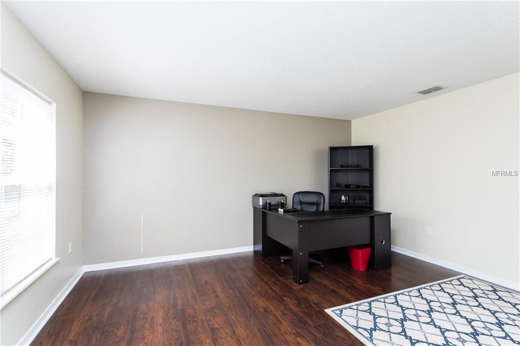 4026 GREENLEAF DRIVE, KISSIMMEE, Florida 34744, 4 Bedrooms Bedrooms, 8 Rooms Rooms,2 BathroomsBathrooms,Residential,For sale,GREENLEAF,O5561291