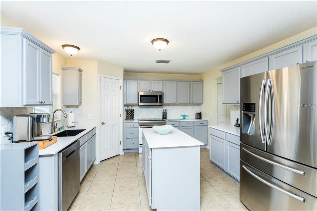 4026 GREENLEAF DRIVE, KISSIMMEE, Florida 34744, 4 Bedrooms Bedrooms, 8 Rooms Rooms,2 BathroomsBathrooms,Residential,For sale,GREENLEAF,O5561291