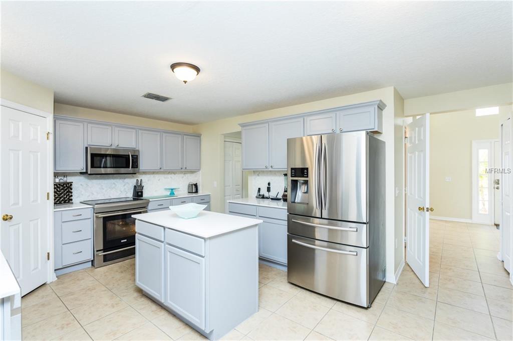 4026 GREENLEAF DRIVE, KISSIMMEE, Florida 34744, 4 Bedrooms Bedrooms, 8 Rooms Rooms,2 BathroomsBathrooms,Residential,For sale,GREENLEAF,O5561291