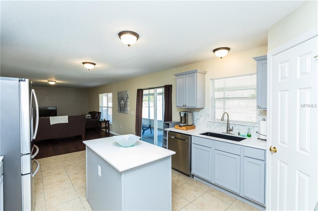 4026 GREENLEAF DRIVE, KISSIMMEE, Florida 34744, 4 Bedrooms Bedrooms, 8 Rooms Rooms,2 BathroomsBathrooms,Residential,For sale,GREENLEAF,O5561291