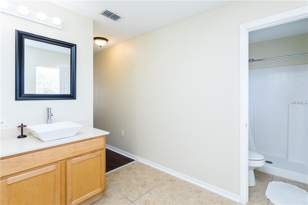 4026 GREENLEAF DRIVE, KISSIMMEE, Florida 34744, 4 Bedrooms Bedrooms, 8 Rooms Rooms,2 BathroomsBathrooms,Residential,For sale,GREENLEAF,O5561291