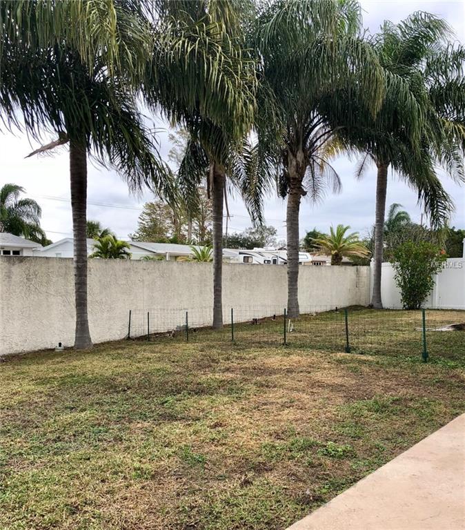 1061 SAWGRASS DRIVE, TARPON SPRINGS, Florida 34689, 3 Bedrooms Bedrooms, 4 Rooms Rooms,2 BathroomsBathrooms,Residential,For sale,SAWGRASS,T2921198