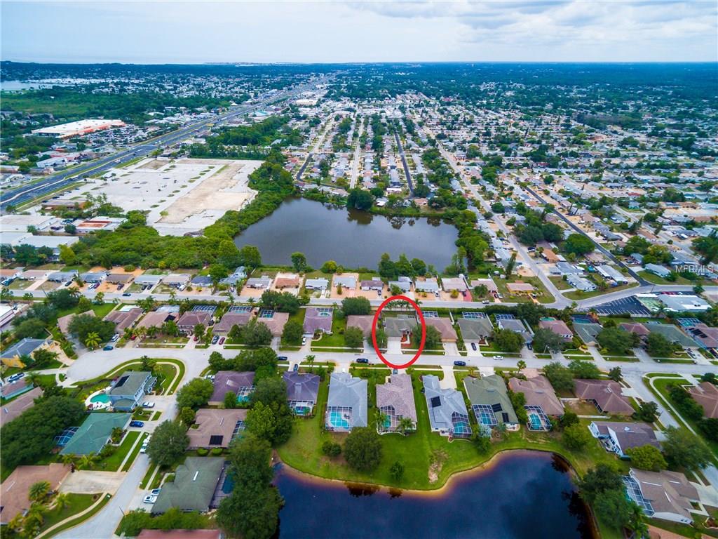 1061 SAWGRASS DRIVE, TARPON SPRINGS, Florida 34689, 3 Bedrooms Bedrooms, 4 Rooms Rooms,2 BathroomsBathrooms,Residential,For sale,SAWGRASS,T2921198