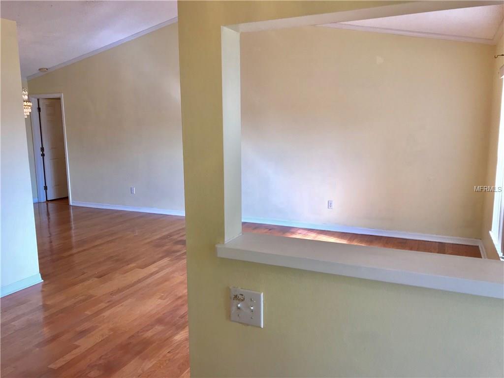 732 AMERICANA COURT, KISSIMMEE, Florida 34758, 3 Bedrooms Bedrooms, 9 Rooms Rooms,2 BathroomsBathrooms,Residential,For sale,AMERICANA,O5560684