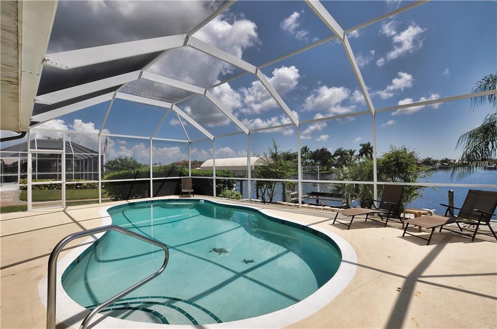 15842 AQUA CIRCLE, PORT CHARLOTTE, Florida 33981, 4 Bedrooms Bedrooms, 9 Rooms Rooms,2 BathroomsBathrooms,Residential,For sale,AQUA,C7243038