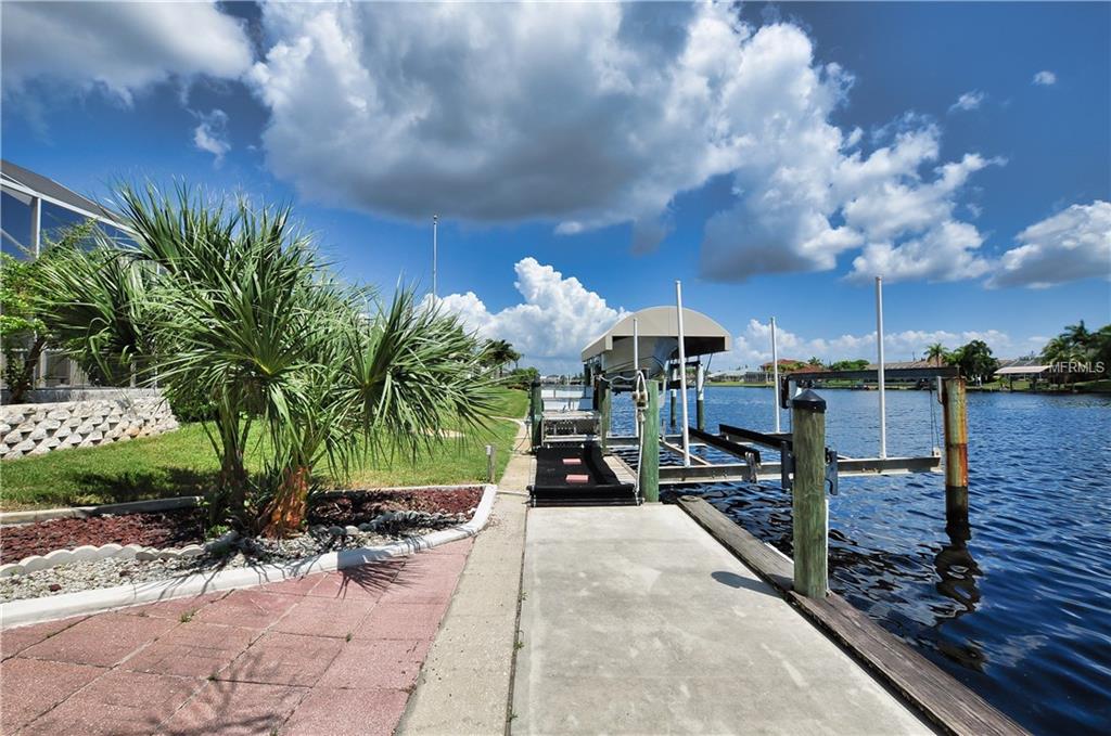 15842 AQUA CIRCLE, PORT CHARLOTTE, Florida 33981, 4 Bedrooms Bedrooms, 9 Rooms Rooms,2 BathroomsBathrooms,Residential,For sale,AQUA,C7243038