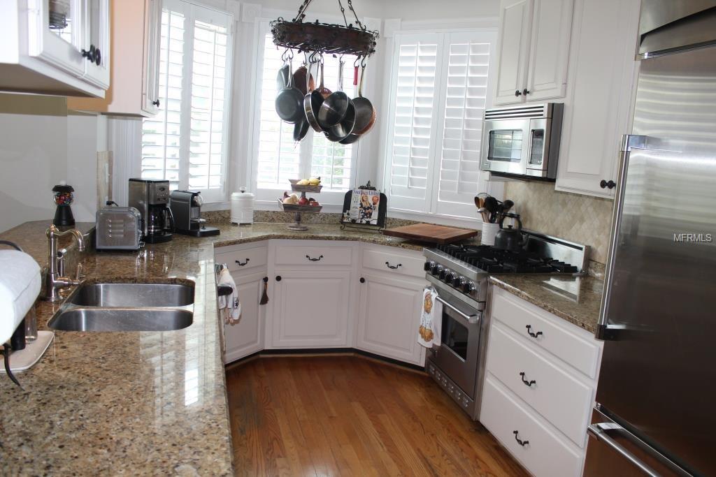 1119 BELLEAIRE CIRCLE, ORLANDO, Florida 32804, 4 Bedrooms Bedrooms, 6 Rooms Rooms,3 BathroomsBathrooms,Residential,For sale,BELLEAIRE,A4208741