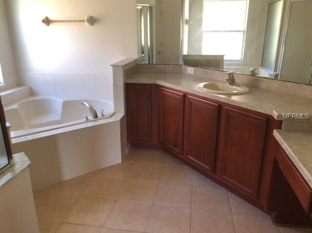 4041 BOUGAINVILLEA PLACE, KISSIMMEE, Florida 34746, 4 Bedrooms Bedrooms, 3 Rooms Rooms,3 BathroomsBathrooms,Residential,For sale,BOUGAINVILLEA,O5550911