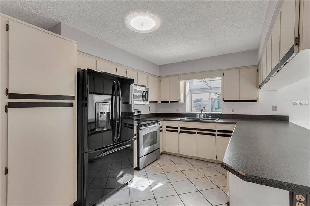 7812 WHITE ASH STREET, ORLANDO, Florida 32819, 3 Bedrooms Bedrooms, 8 Rooms Rooms,2 BathroomsBathrooms,Residential,For sale,WHITE ASH,O5556576