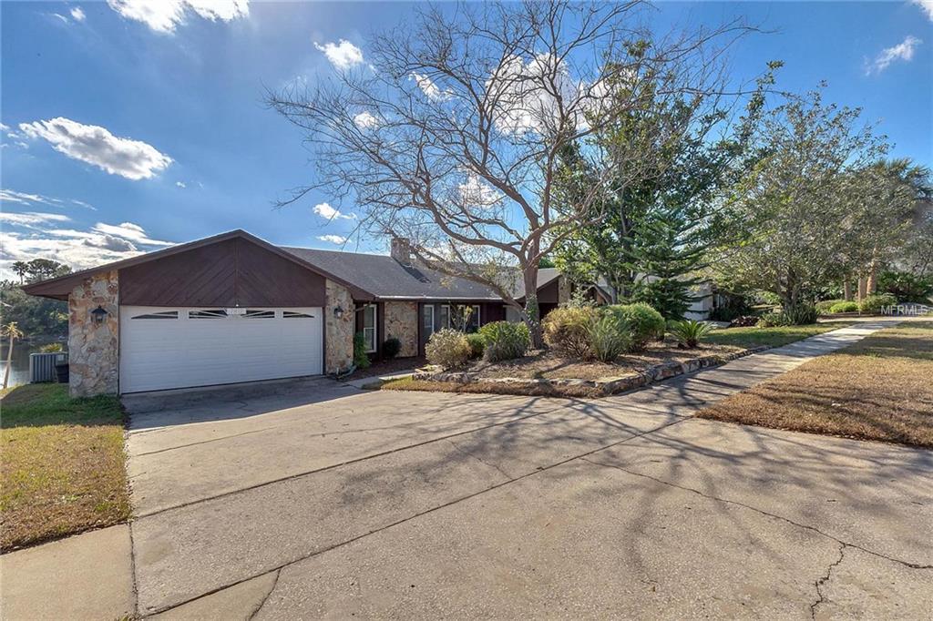 7812 WHITE ASH STREET, ORLANDO, Florida 32819, 3 Bedrooms Bedrooms, 8 Rooms Rooms,2 BathroomsBathrooms,Residential,For sale,WHITE ASH,O5556576