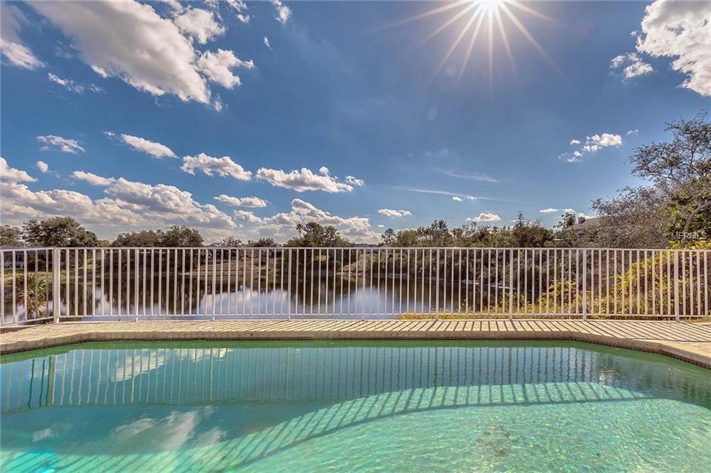 7812 WHITE ASH STREET, ORLANDO, Florida 32819, 3 Bedrooms Bedrooms, 8 Rooms Rooms,2 BathroomsBathrooms,Residential,For sale,WHITE ASH,O5556576