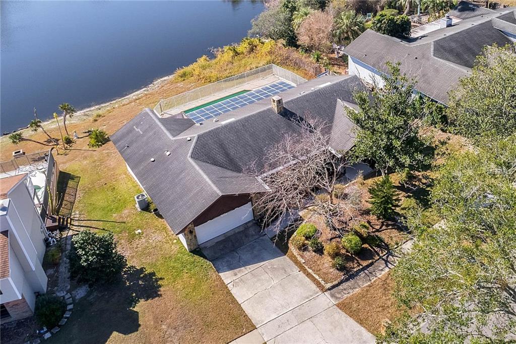 7812 WHITE ASH STREET, ORLANDO, Florida 32819, 3 Bedrooms Bedrooms, 8 Rooms Rooms,2 BathroomsBathrooms,Residential,For sale,WHITE ASH,O5556576