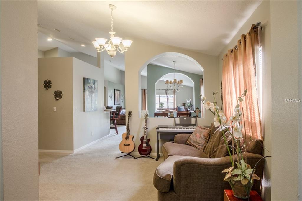 302 RED KITE DRIVE, GROVELAND, Florida 34736, 3 Bedrooms Bedrooms, 8 Rooms Rooms,2 BathroomsBathrooms,Residential,For sale,RED KITE,G4852785