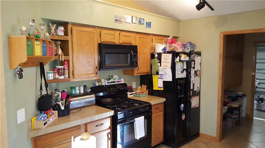 1090 SUNSHINE WAY SW, WINTER HAVEN, Florida 33880, 3 Bedrooms Bedrooms, 5 Rooms Rooms,2 BathroomsBathrooms,Residential,For sale,SUNSHINE,P4718512