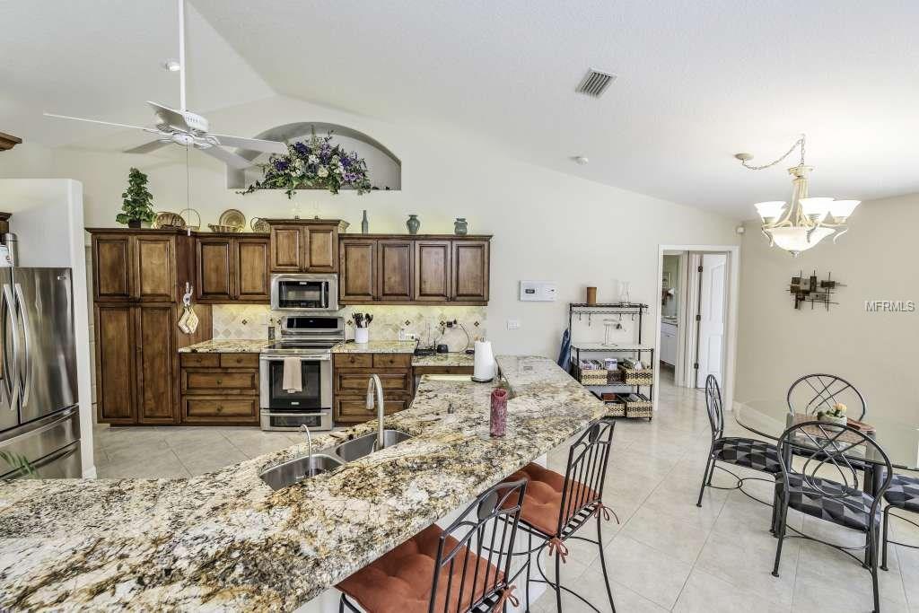 9460 MIGUE CIRCLE, PORT CHARLOTTE, Florida 33981, 3 Bedrooms Bedrooms, 9 Rooms Rooms,2 BathroomsBathrooms,Residential,For sale,MIGUE,D5922896