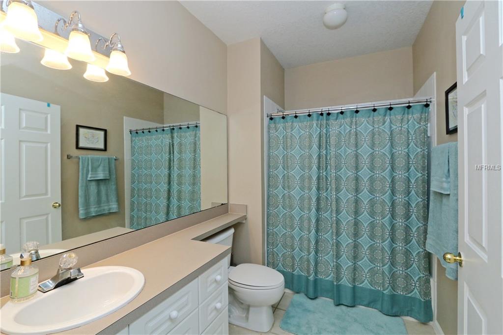 233 GOLDENRAIN DRIVE, CELEBRATION, Florida 34747, 2 Bedrooms Bedrooms, 5 Rooms Rooms,2 BathroomsBathrooms,Residential,For sale,GOLDENRAIN,O5561522