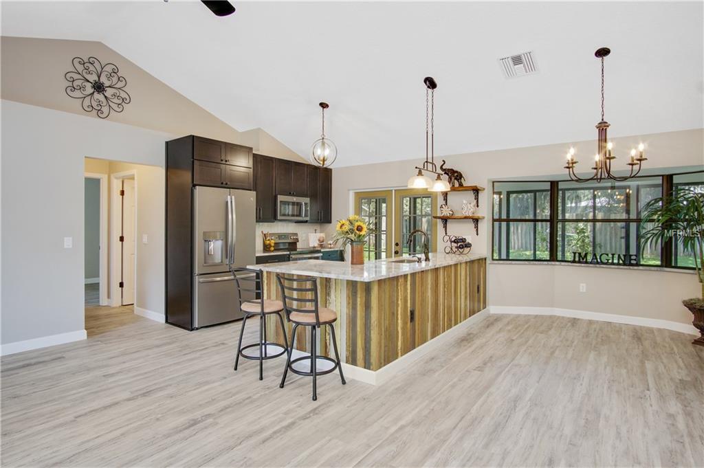 4125 DORA WOOD DRIVE, MOUNT DORA, Florida 32757, 3 Bedrooms Bedrooms, 7 Rooms Rooms,2 BathroomsBathrooms,Residential,For sale,DORA WOOD,O5552886