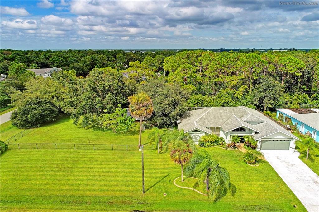 6118 GILLOT BOULEVARD, PORT CHARLOTTE, Florida 33981, 3 Bedrooms Bedrooms, 8 Rooms Rooms,2 BathroomsBathrooms,Residential,For sale,GILLOT,D5920451