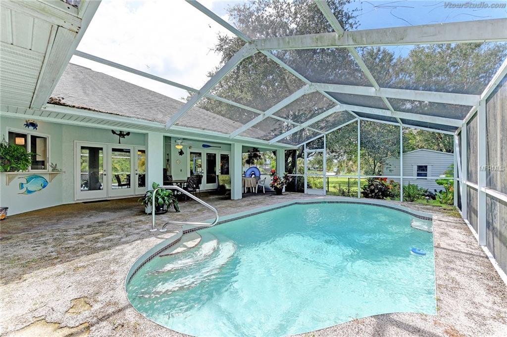 6118 GILLOT BOULEVARD, PORT CHARLOTTE, Florida 33981, 3 Bedrooms Bedrooms, 8 Rooms Rooms,2 BathroomsBathrooms,Residential,For sale,GILLOT,D5920451