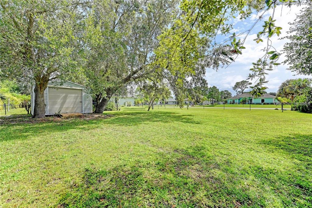 6118 GILLOT BOULEVARD, PORT CHARLOTTE, Florida 33981, 3 Bedrooms Bedrooms, 8 Rooms Rooms,2 BathroomsBathrooms,Residential,For sale,GILLOT,D5920451