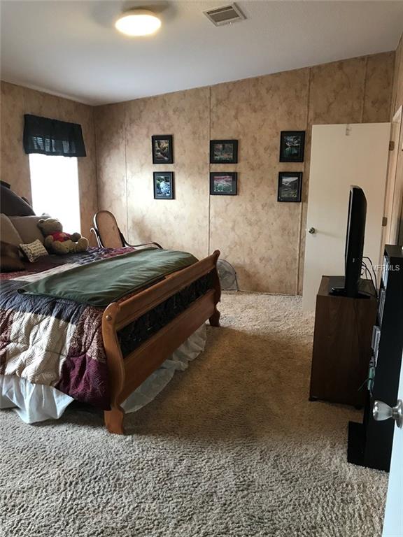 8801 JANMAR ROAD, DADE CITY, Florida 33525, 3 Bedrooms Bedrooms, 5 Rooms Rooms,2 BathroomsBathrooms,Residential,For sale,JANMAR,E2205730