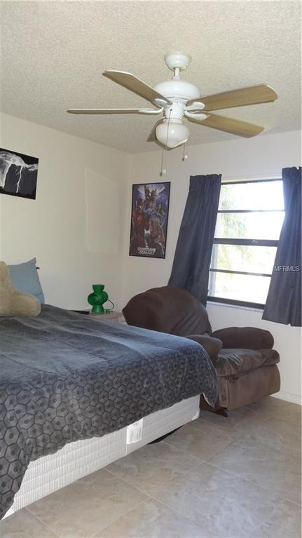 26336 DEEP CREEK BOULEVARD, PUNTA GORDA, Florida 33983, 3 Bedrooms Bedrooms, 7 Rooms Rooms,2 BathroomsBathrooms,Residential,For sale,DEEP CREEK,C7248164