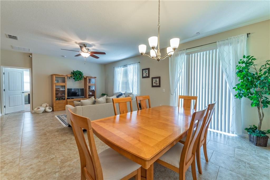 107 SMITHFIELD PLACE, DAVENPORT, Florida 33837, 4 Bedrooms Bedrooms, 5 Rooms Rooms,2 BathroomsBathrooms,Residential,For sale,SMITHFIELD,O5561896