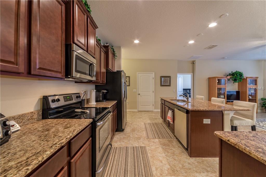 107 SMITHFIELD PLACE, DAVENPORT, Florida 33837, 4 Bedrooms Bedrooms, 5 Rooms Rooms,2 BathroomsBathrooms,Residential,For sale,SMITHFIELD,O5561896