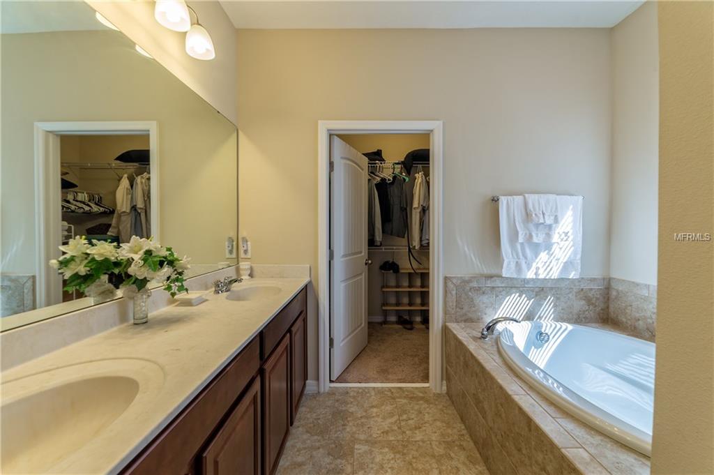 107 SMITHFIELD PLACE, DAVENPORT, Florida 33837, 4 Bedrooms Bedrooms, 5 Rooms Rooms,2 BathroomsBathrooms,Residential,For sale,SMITHFIELD,O5561896