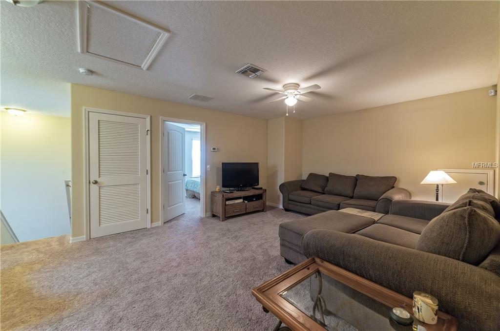 107 SMITHFIELD PLACE, DAVENPORT, Florida 33837, 4 Bedrooms Bedrooms, 5 Rooms Rooms,2 BathroomsBathrooms,Residential,For sale,SMITHFIELD,O5561896