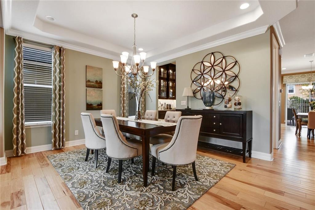 4951 MILLENNIA GREEN DRIVE, ORLANDO, Florida 32811, 4 Bedrooms Bedrooms, 7 Rooms Rooms,2 BathroomsBathrooms,Residential,For sale,MILLENNIA GREEN,O5562012