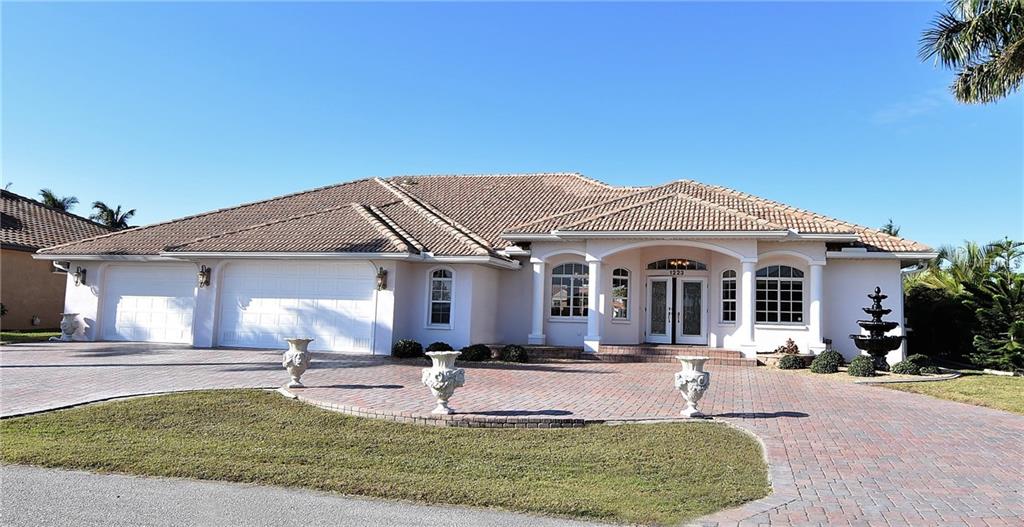 1223 RIDING ROCKS LANE, PUNTA GORDA, Florida 33950, 4 Bedrooms Bedrooms, 10 Rooms Rooms,3 BathroomsBathrooms,Residential,For sale,RIDING ROCKS,C7247376
