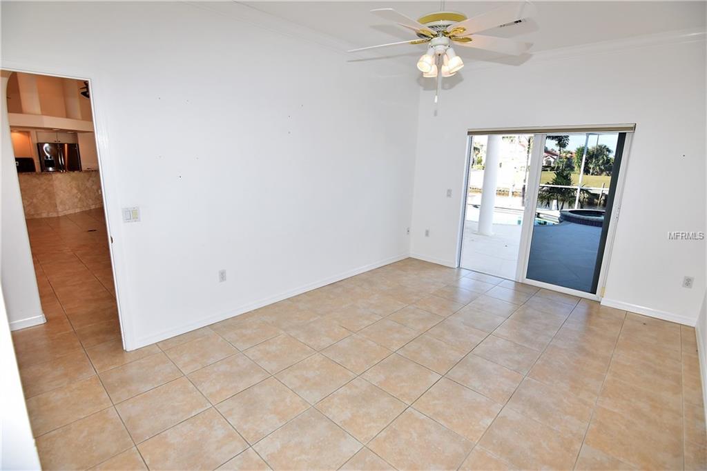 1223 RIDING ROCKS LANE, PUNTA GORDA, Florida 33950, 4 Bedrooms Bedrooms, 10 Rooms Rooms,3 BathroomsBathrooms,Residential,For sale,RIDING ROCKS,C7247376
