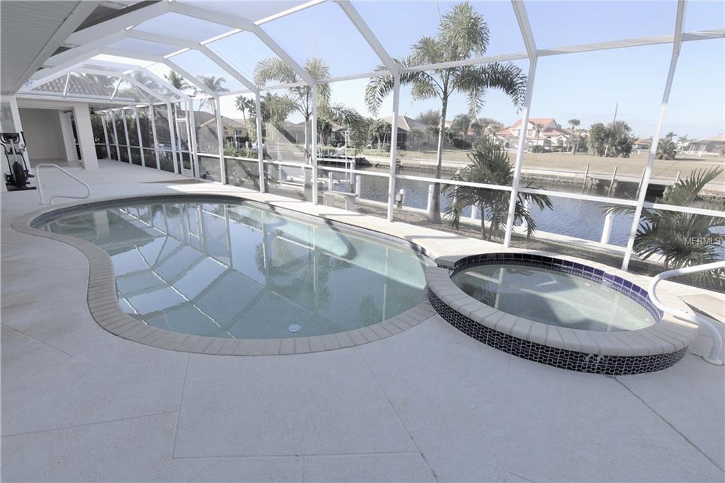 1223 RIDING ROCKS LANE, PUNTA GORDA, Florida 33950, 4 Bedrooms Bedrooms, 10 Rooms Rooms,3 BathroomsBathrooms,Residential,For sale,RIDING ROCKS,C7247376