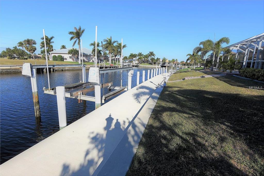 1223 RIDING ROCKS LANE, PUNTA GORDA, Florida 33950, 4 Bedrooms Bedrooms, 10 Rooms Rooms,3 BathroomsBathrooms,Residential,For sale,RIDING ROCKS,C7247376